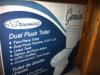 Dual flush toilet... New in sealed box